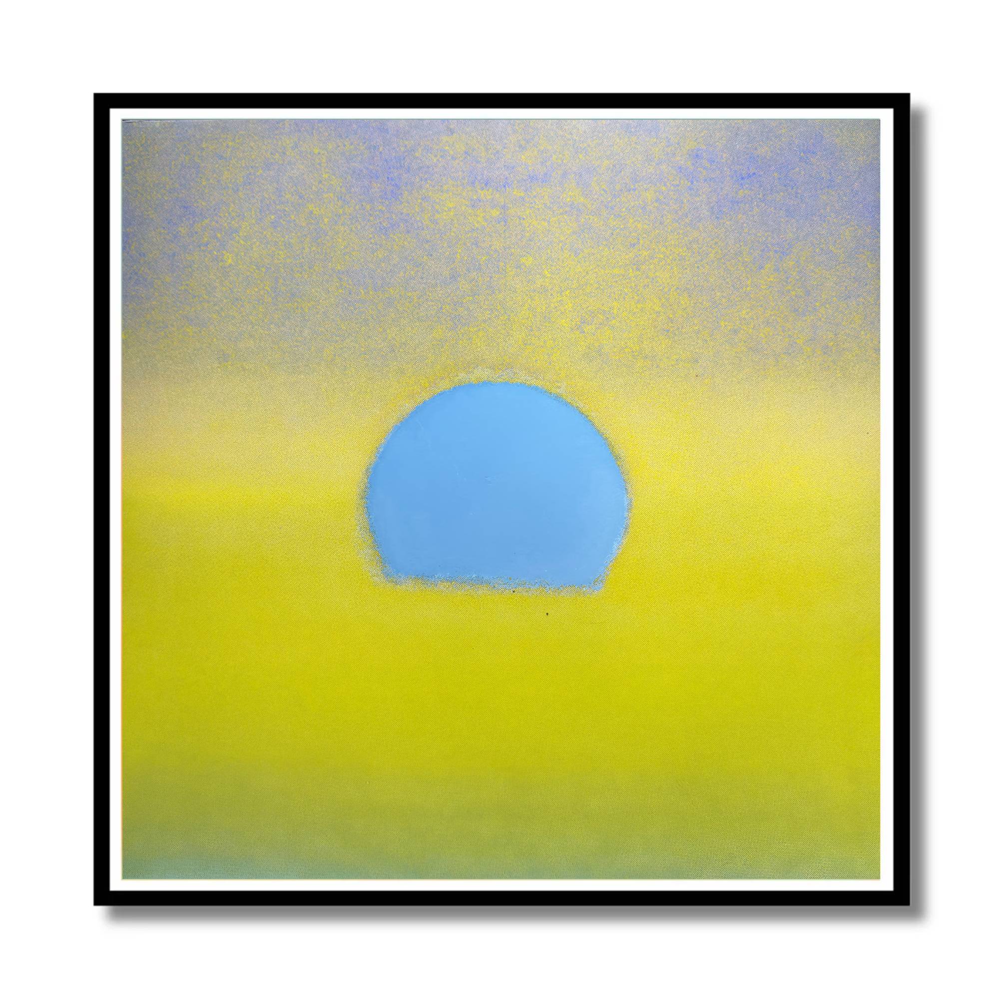 Abstract square wall art featuring a soft yellow field with a central light blue oval shape, presented in a black frame with a white mat against a white background.